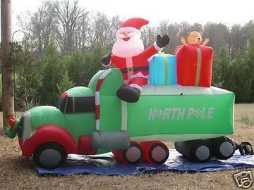 Гигантское раздувное рождество продуктов рекламы орнаментирует Санта Клауса с автомобилем