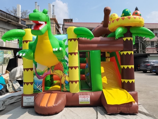Изготовленный на заказ раздувной надувной замок с домом прыжка темы динозавров скольжения для детей