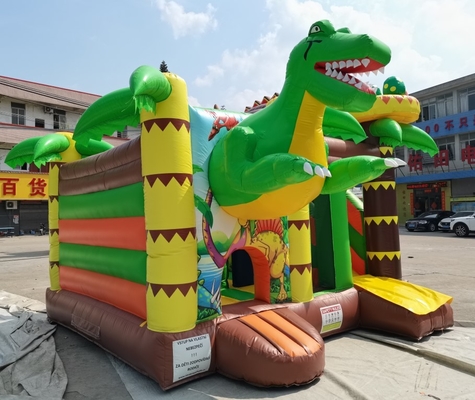 Изготовленный на заказ раздувной надувной замок с домом прыжка темы динозавров скольжения для детей